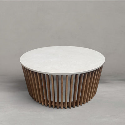 HANKI Coffee Tables collection — Moraine round coffee table with light stone top and fluted timber spindle base