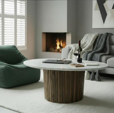 HANKI Coffee Tables collection — Moraine round coffee table with light stone top and fluted timber spindle base