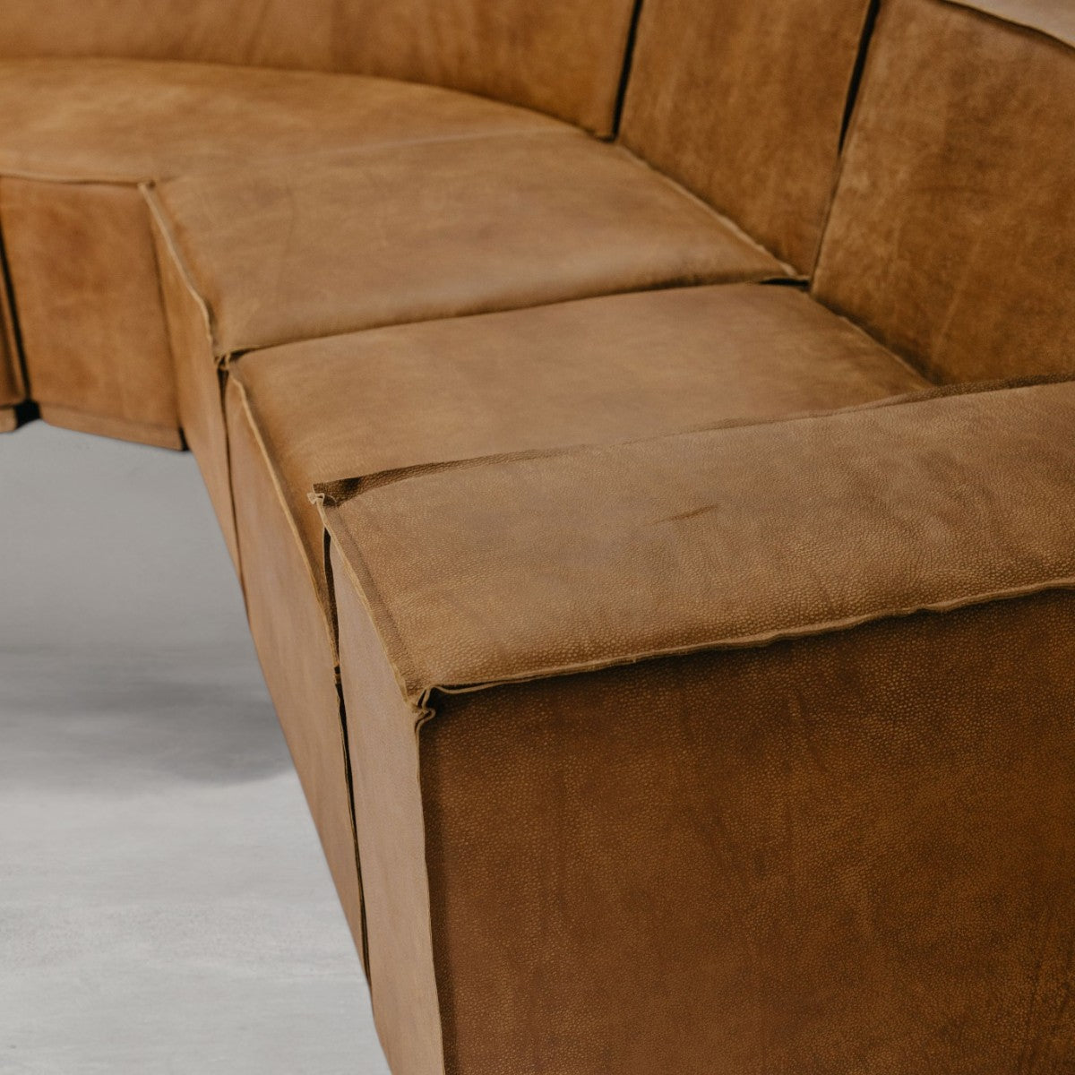 HANKI Alden leather sofa seat and armrest corner close-up