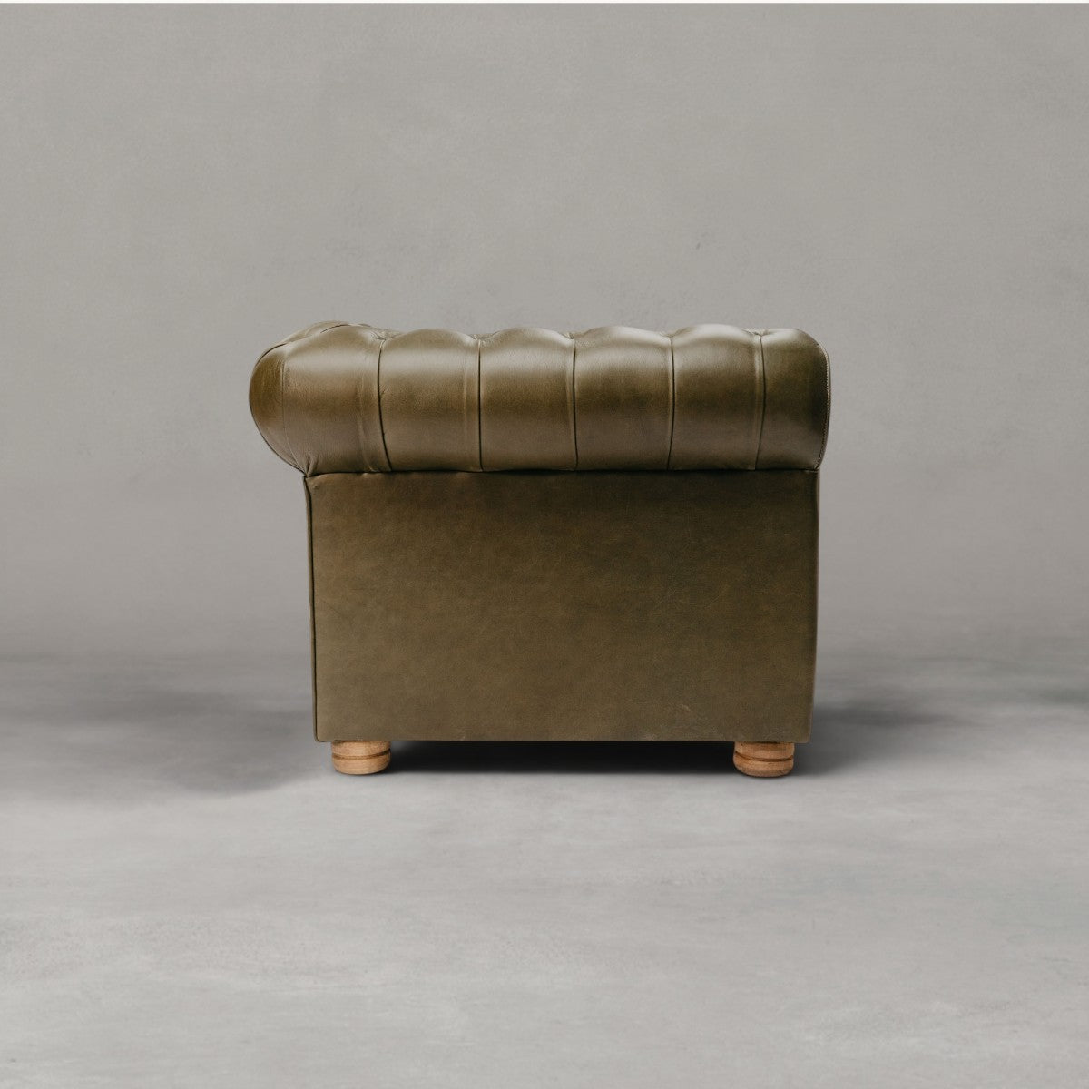HANKI Dorne Chesterfield sofa tufted arm and wooden bun feet detail