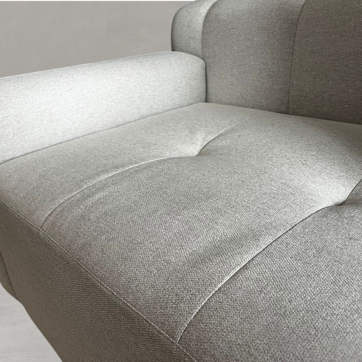 HANKI Ave fabric sofa grid-tufted cushion close-up