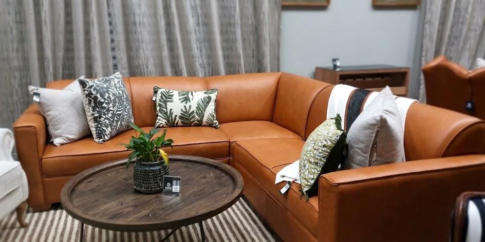 HANKI Toren L-shape leather sofa styled in a living space