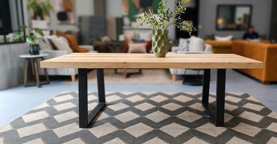 HANKI Caelen dining table styled in showroom with decor
